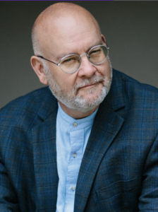 Headshot of Andrew Megill